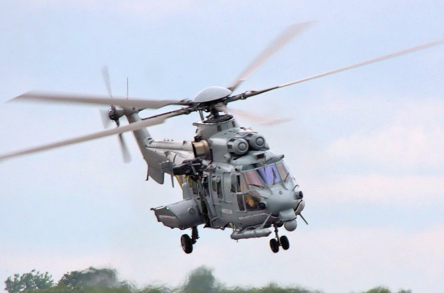 Close up of large helicopter flying
