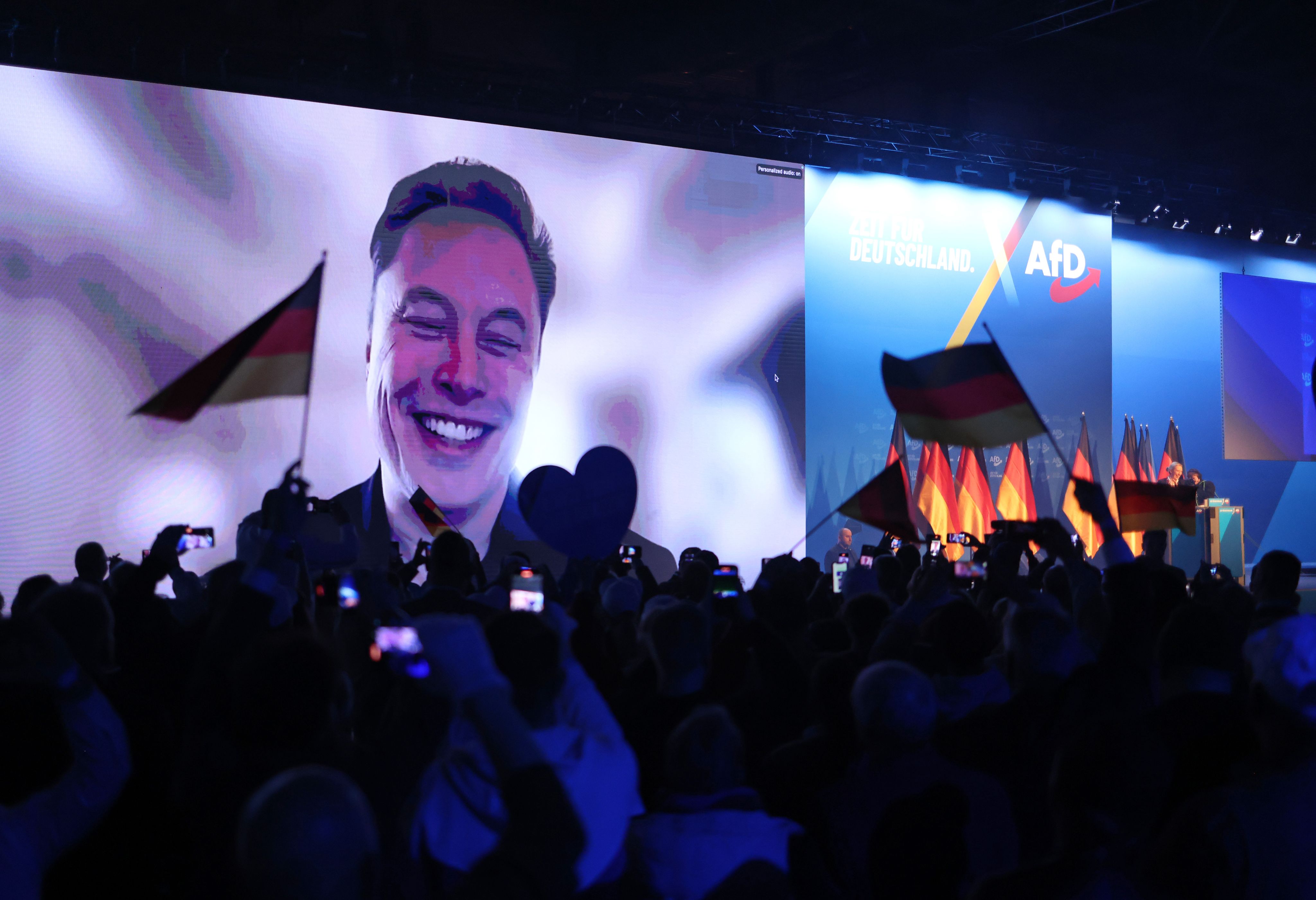 Elon Musk speaks live via a video transmission during the campaign of the far-right Alternative for Germany (AfD) party in Halle, Germany.
